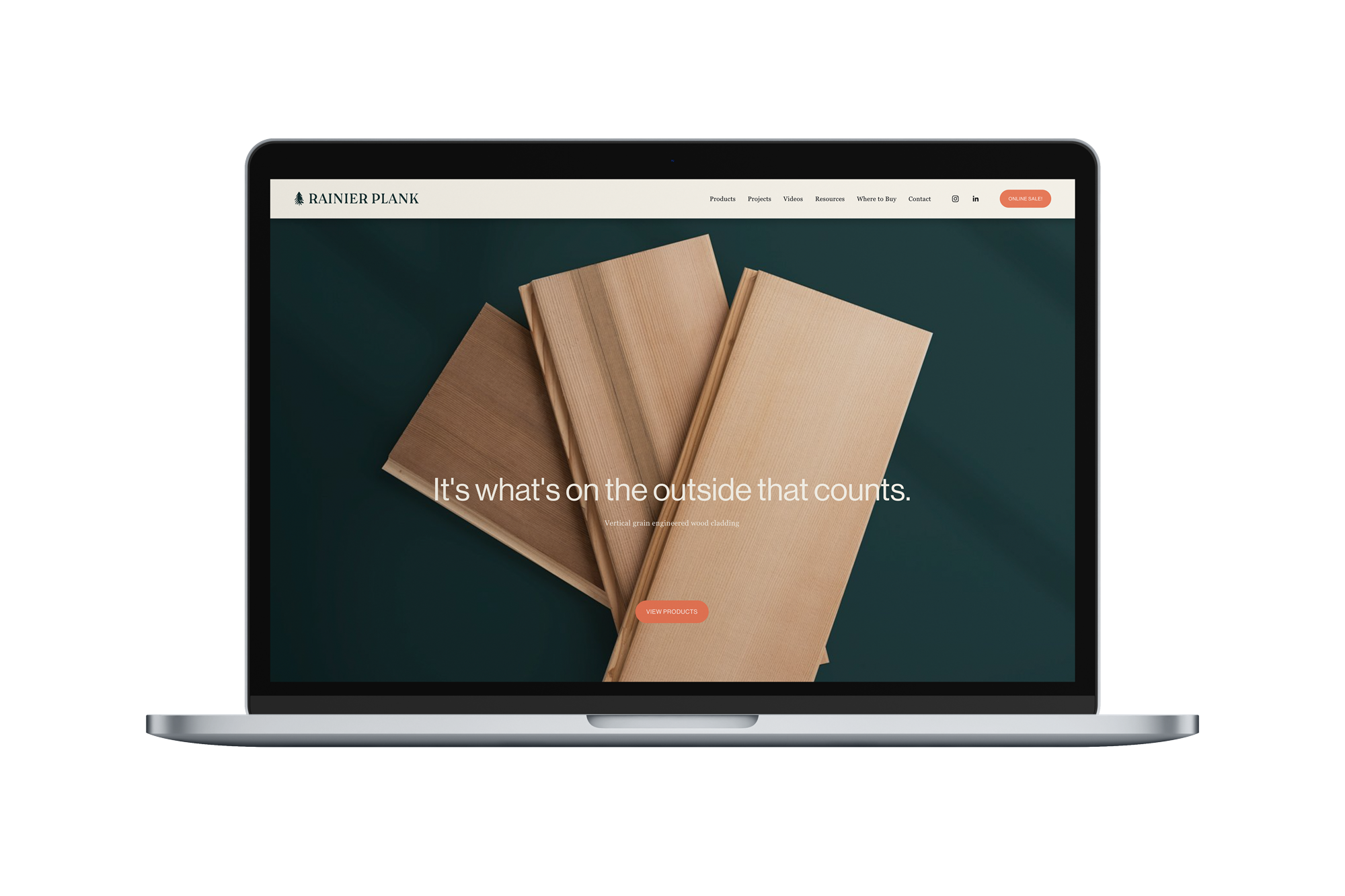 Website after the rebrand, laptop mockup — Rainier Plank